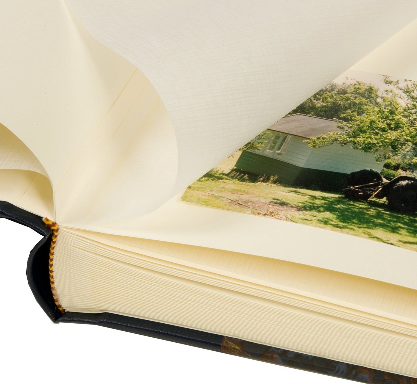 Interleaved pages of the Locketts Large Square Traditional Photo Album
